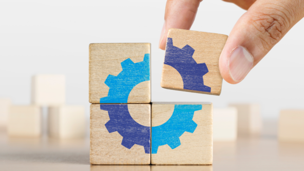 Blocks of wood with blue gear design